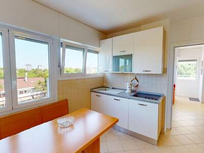 Wohnung mit Balkon kaufen in 33054 Lignano Sabbiadoro (Bild 2)