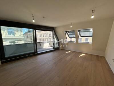 Dachgeschosswohnung kaufen in 1040 Wien