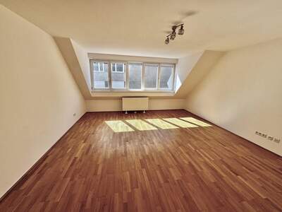 Dachgeschosswohnung kaufen in 1060 Wien