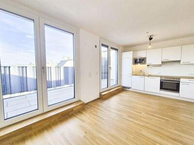 Dachgeschosswohnung kaufen in 1110 Wien