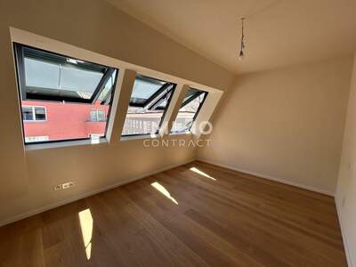 Dachgeschosswohnung kaufen in 1040 Wien